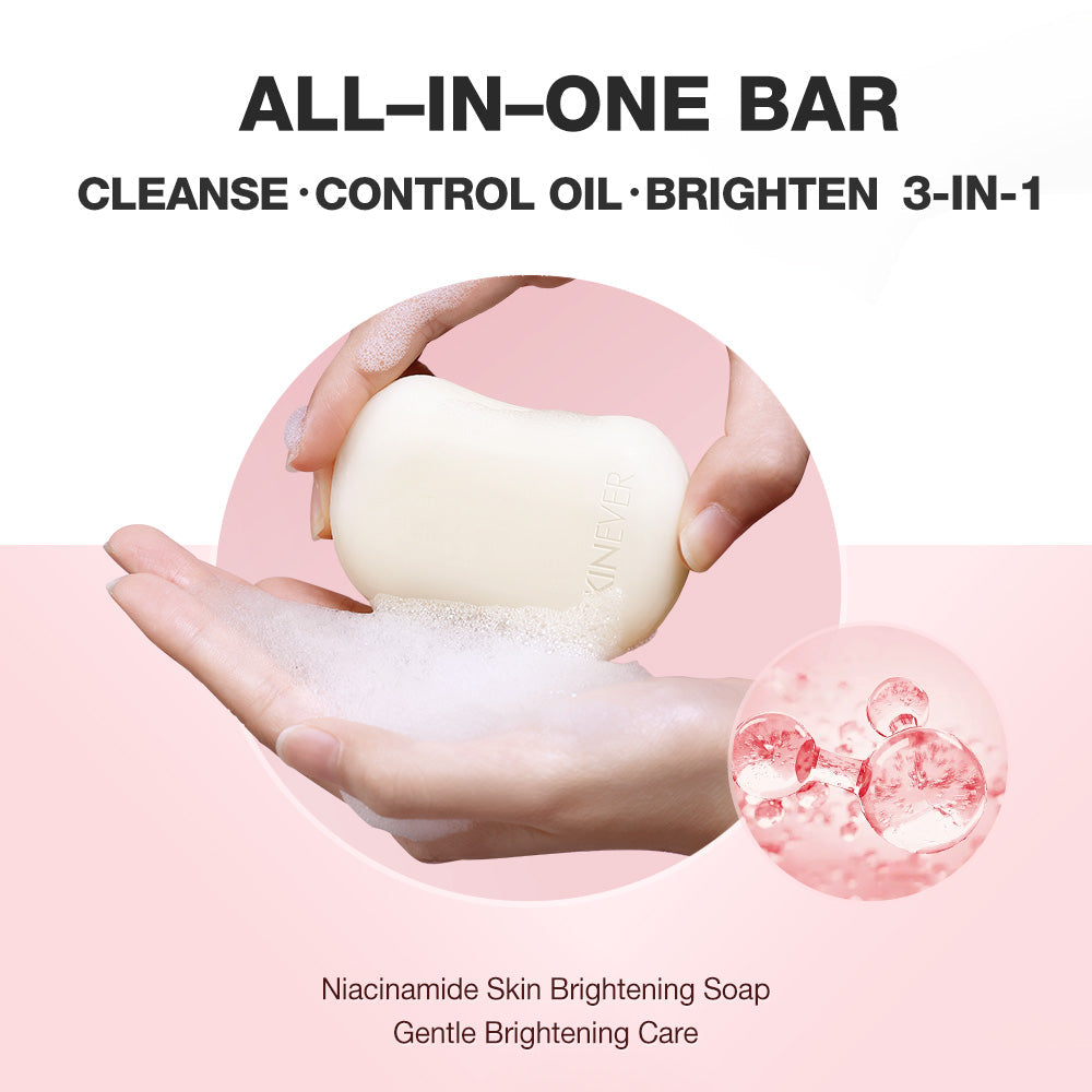 Soap bar with hands holding it and bubbles, labeled 'All-in-One Bar' on a pink background.