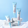 Three skincare tubes with blue and white design on a light blue background
