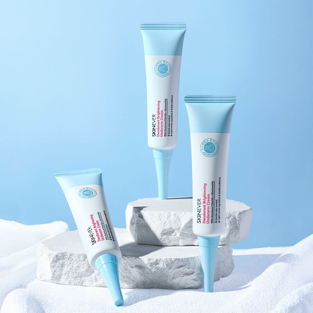 Three skincare tubes with blue and white design on a light blue background